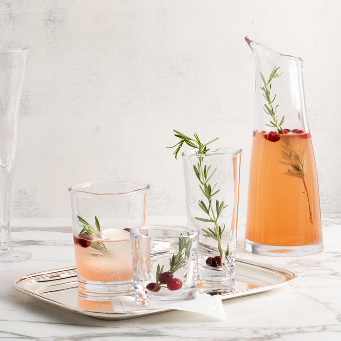 Abraham Scissor-Cut Glass Tumbler, 6 oz., clear, thick, air-blown glass with rippled rim.