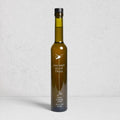 Ancient Olive Trees Dirty Martini Juice in a tall, dark green glass bottle with a black cap.