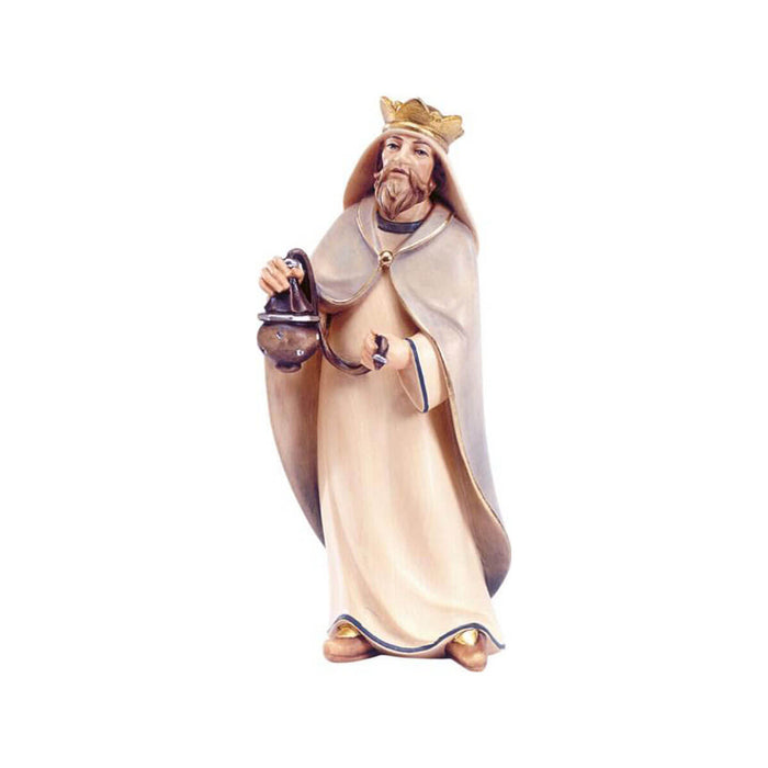 Sculpted wooden Standing King figurine for Artis Nativity set. He is dressed in a flowing robe and cloak, wearing a crown, and carrying an incense burner in his hands.