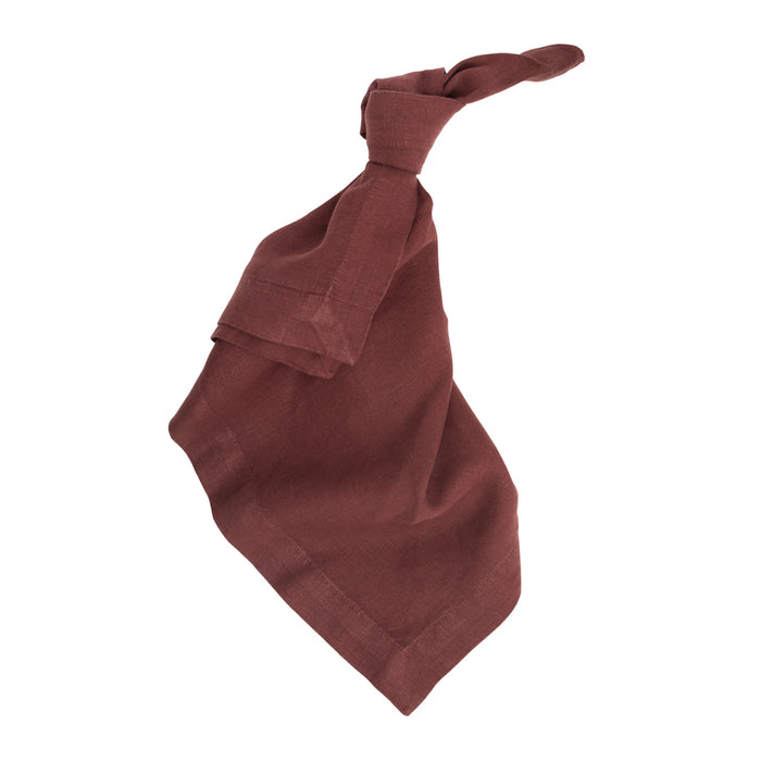 Barnwood HG Signature Hand-dyed Linen Napkin, 22-inch square, soft warm maroon, tied in a knot.