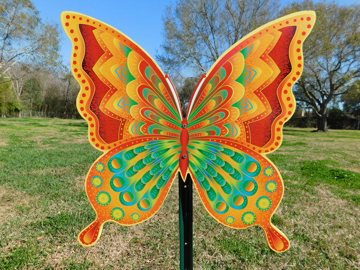 Outdoor Butterfly Decorations for lawns, yards, gardens and walkways. This yard butterfly sign is propped up with a metal stake.