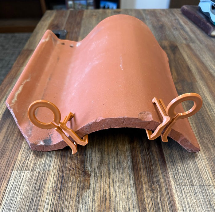 Certified Lights C9 Tuff Tile Clip in terracotta, designed for Spanish tile roofs. Features a wide opening and living hinge.