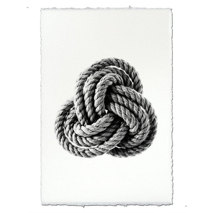 Black and white Carrick Nautical Knot rope art print on handmade Nepalese paper with deckled edges.