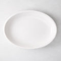 White ceramic deep serving platter, 14"W x 20"L, with high rolled edge.