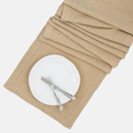 Chai HG Signature hand-dyed linen table runner, 18"x108", with white plate and silverware.