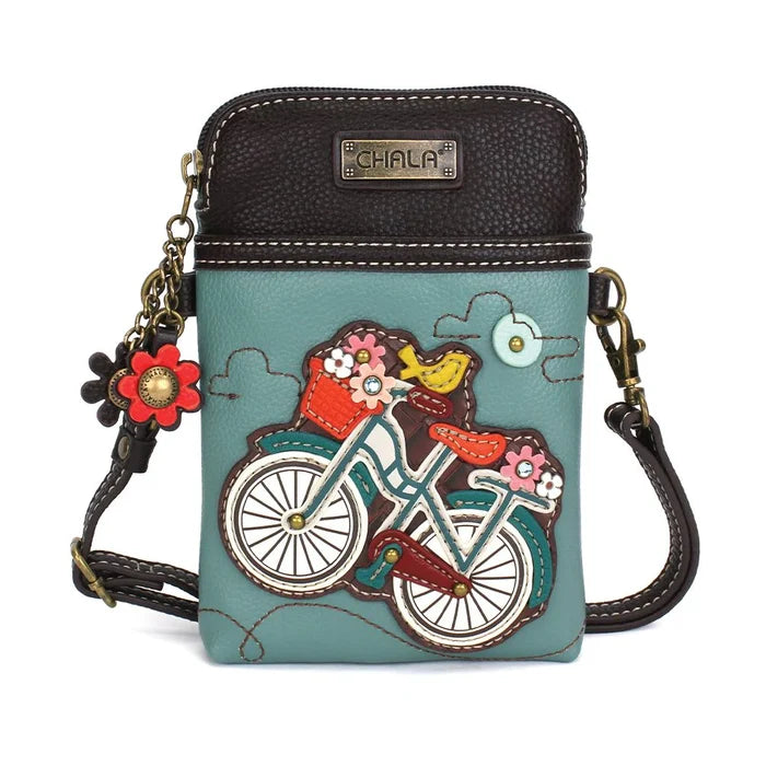Chala handbag with bicycle design and floral elements on a turquoise vegan leather