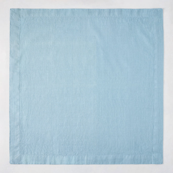 Cloudy HG Signature hand-dyed 22-inch square linen napkin with mitered corners.