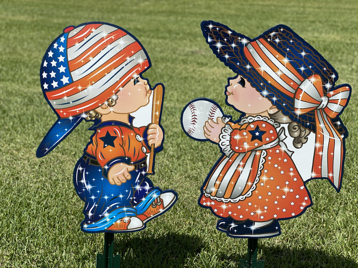 Outdoor yard signs - children playing baseball in patriotic clothing. Glitter finish and red, whtie and blue flag theme.