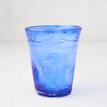 Dark blue Henri mouth-blown glass, 8 oz., with unique imperfections and small air bubbles.