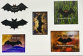 A collection of waterproof vinyl decal stickers with various bat designs and phrases.