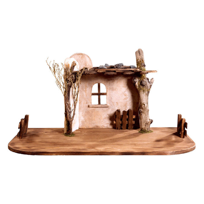 Handcrafted wooden DEUR Artis Nativity stable made in South Tyrol with rustic open-front design.