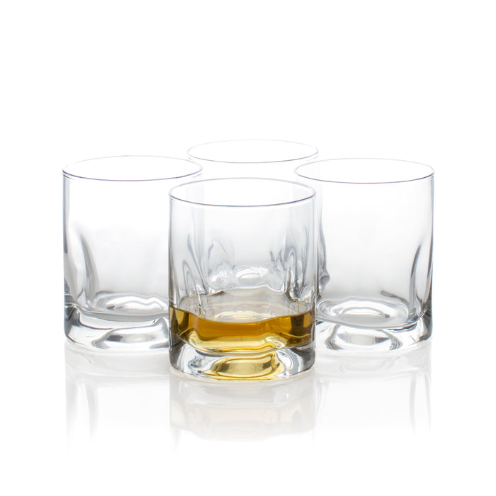 Four clear Hudson Grace Double Old-Fashioned glasses, one filled with amber liquid, on a white background.