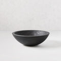 Ebonized wood bowl, 11" diameter, dark finish highlighting wood grain, handcrafted from spalted New England wood.