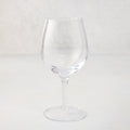 Elijah Small Scissor-Cut 12 oz. clear, thick air-blown glass wine glass with rippled rim.