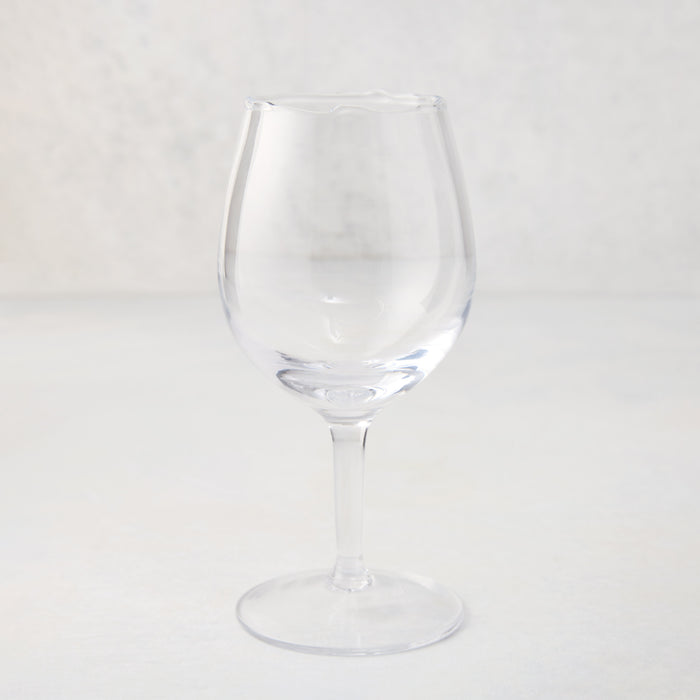 Elijah Small Scissor-Cut 12 oz. clear, thick air-blown glass wine glass with rippled rim.