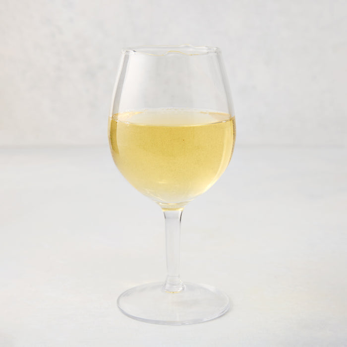 Elijah Small Scissor-Cut Wine Glass, 12 oz., clear air-blown glass with white wine.