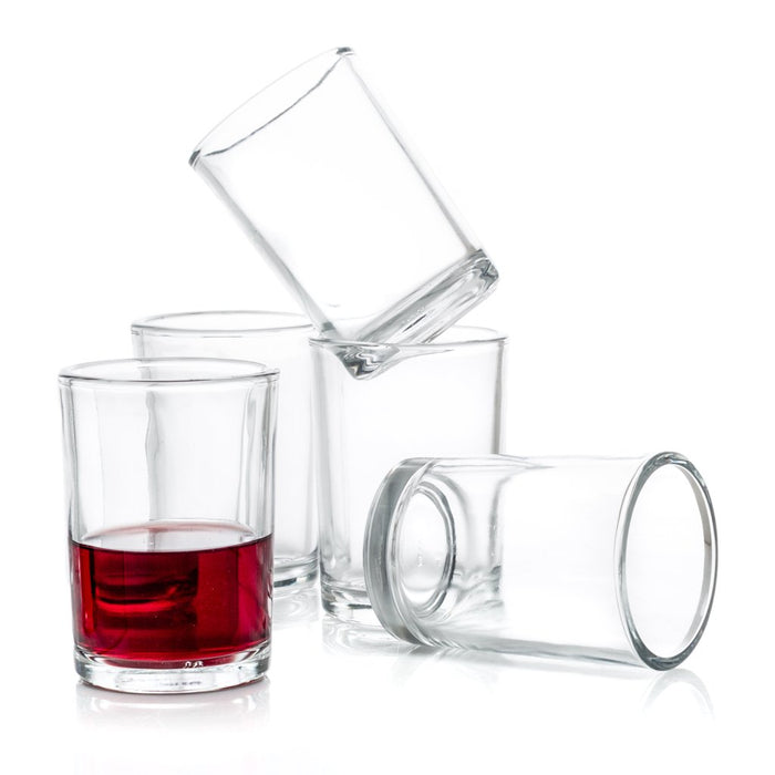 Clear, sturdy, simple 8.5 oz Everyday Wine Glasses, one with red liquid, on a white background.