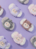 FINDING UNICORN Furry Fridge Magnet Blind Box features fluffy earmuff magnets with cartoon faces and pom-poms, showcasing playful design elements.