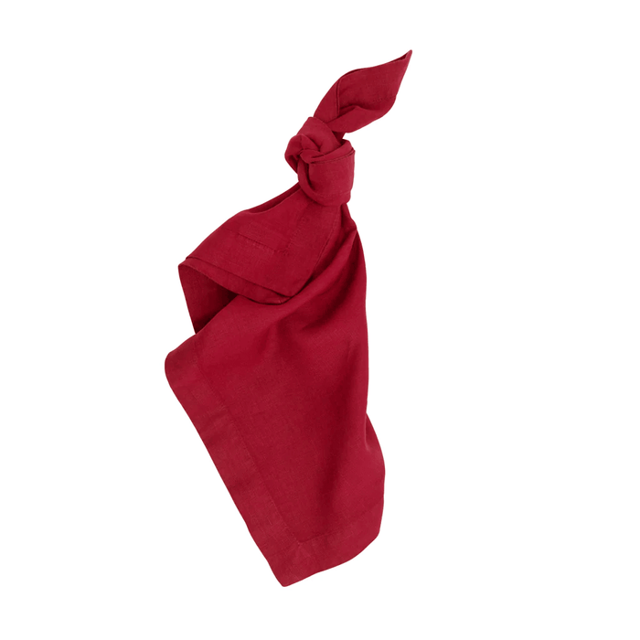 Flame HG Signature hand-dyed 22" square red linen napkin, tied in a knot.