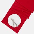 Flame HG Signature hand-dyed red linen table runner with white plate and silverware.