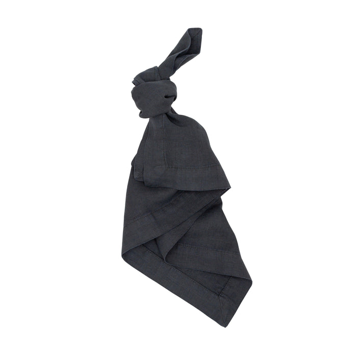 Graphite HG Signature hand-dyed linen napkin, 22" square, tied in a knot.