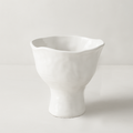 White ceramic pedestal bowl by Montes Doggett, handmade with organic shapes and textured glaze.
