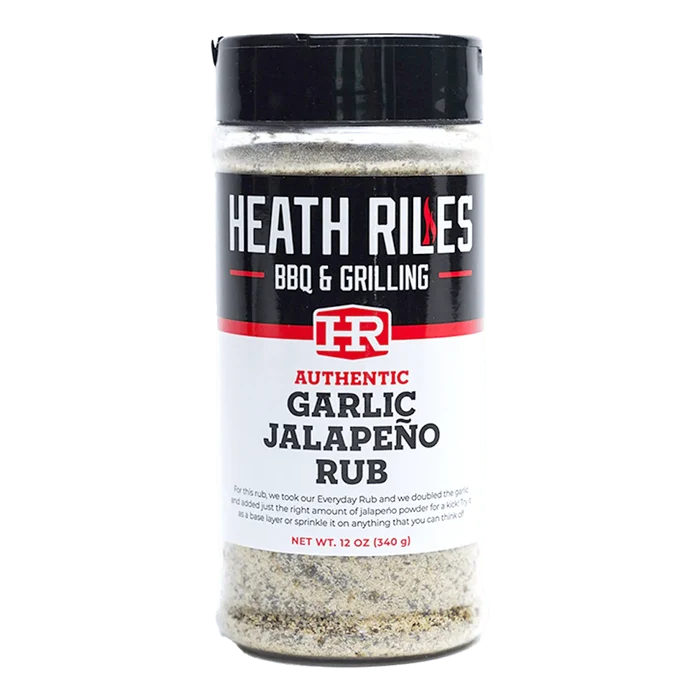 12 oz shaker bottle full of garlic jalapeño rub, a savory and delicious seasoning that's great on everything