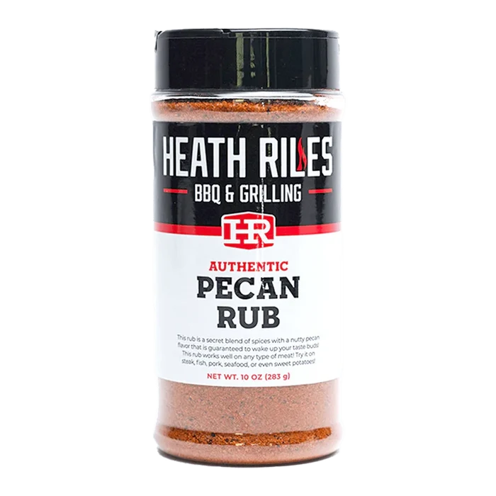 10 ounce shaker bottle full of heath riles bbq & grilling pecan rub, a sweet and savory blend with a pecan forward flavor