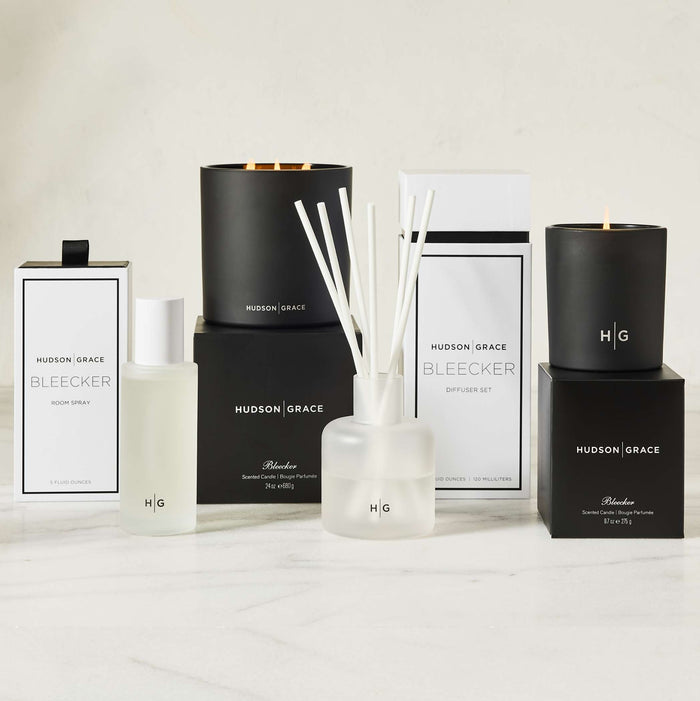 Hudson Grace Bleecker scented candles, room spray, and diffuser set in black and white packaging.