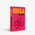 Ibiza Bohemia hardcover book with a vibrant pink cover, yellow "IBIZA" text, and a red abstract plant design.