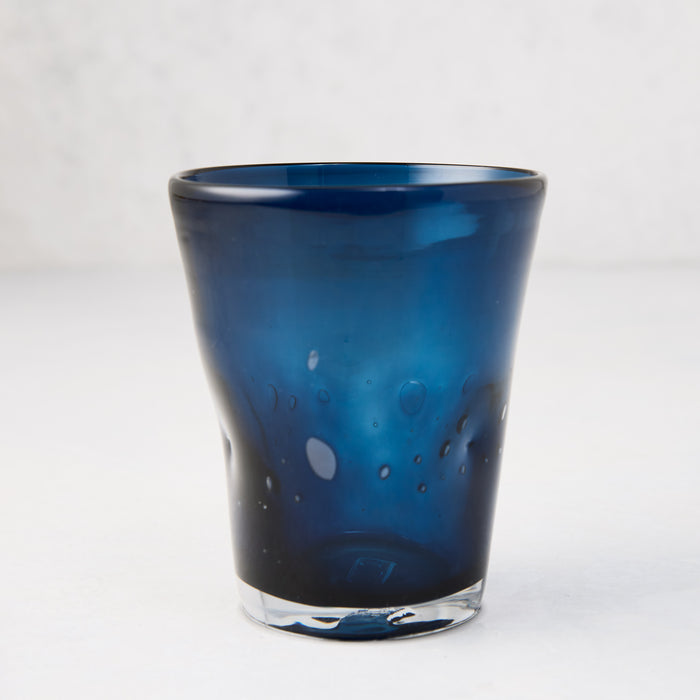 Indigo Henri mouth-blown glass, 8 oz, with unique imperfections and air bubbles.