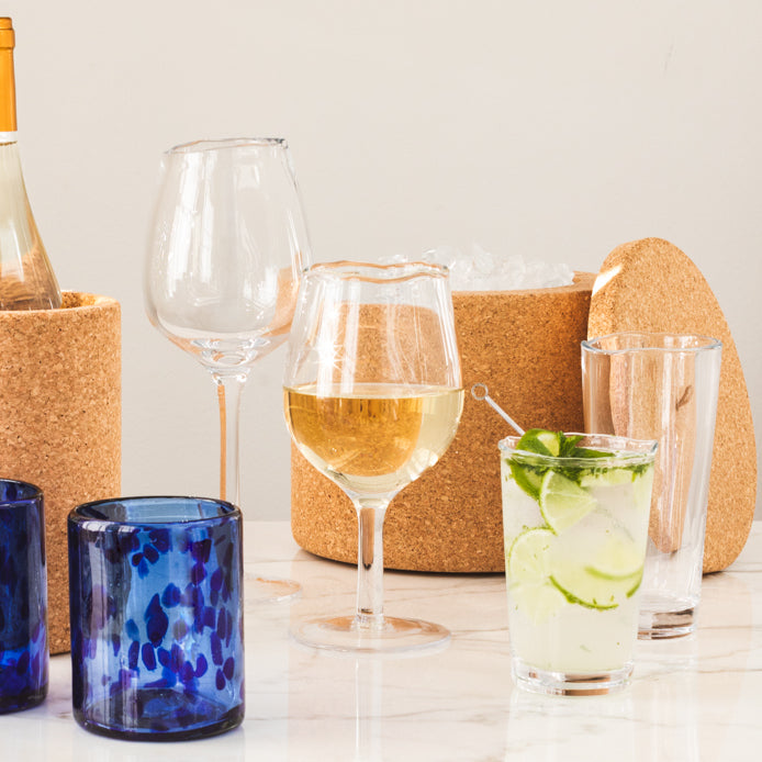 Jacob Scissor-Cut Glass Tumbler, 8 oz., clear, thick, air-blown glass with rippled rim.