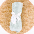 green cotton baby blanket