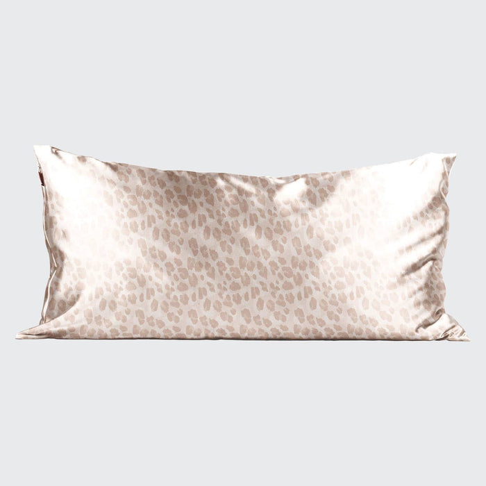 Silk pillowcase with leopard print pattern on a light gray background