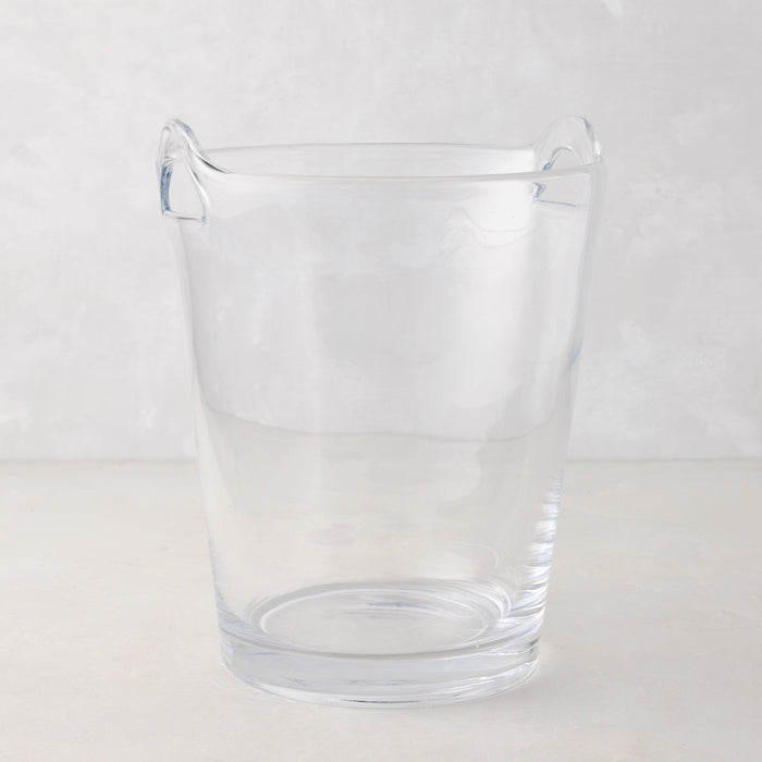 Large clear handblown glass ice bucket with two handles.