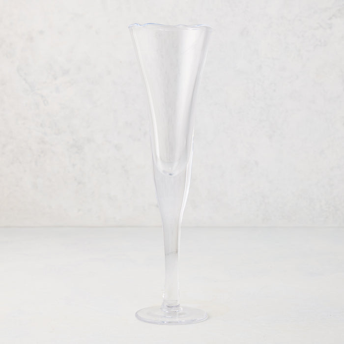Clear, tall scissor-cut glass champagne flute with a rippled rim, 12 oz.