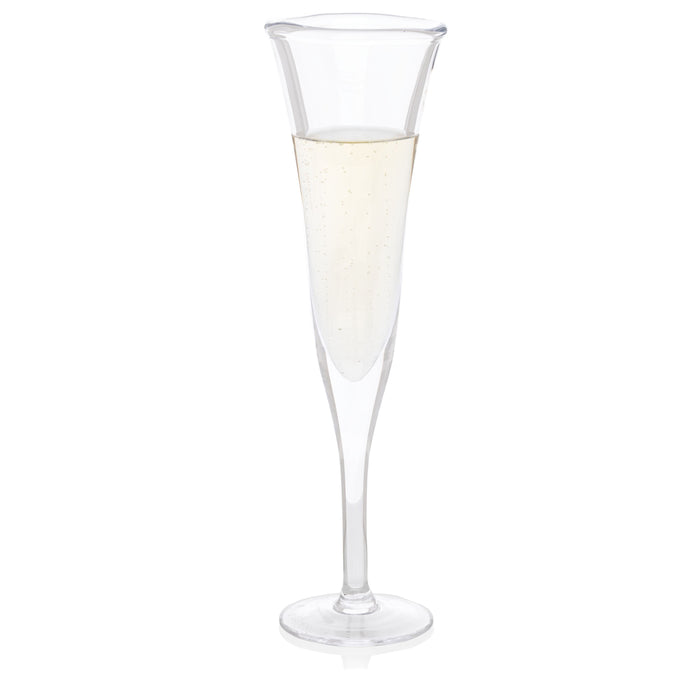 Clear, scissor-cut glass champagne flute with a rippled rim, filled with bubbly champagne.