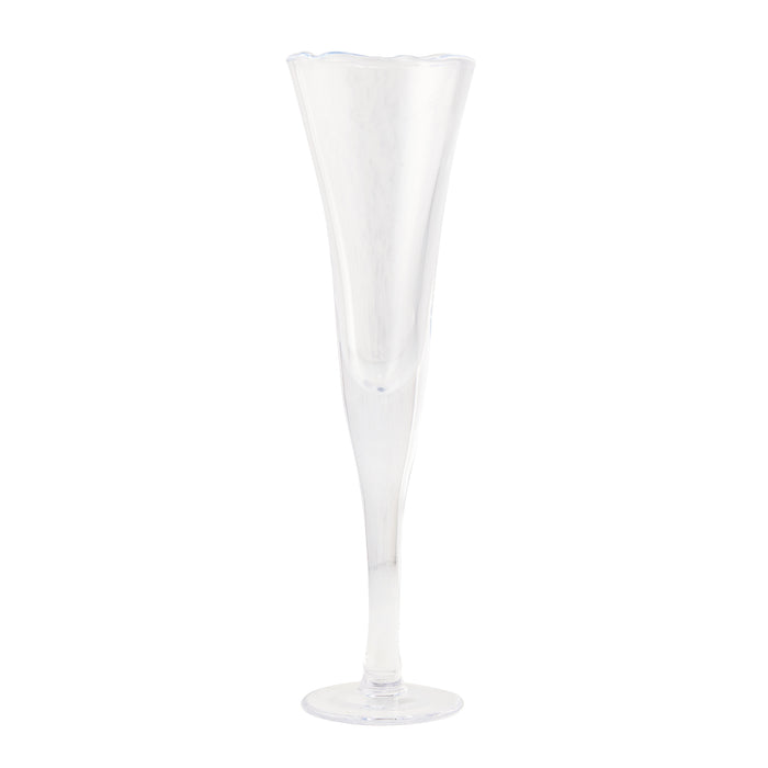 Clear, tall glass champagne flute with a unique rippled, scissor-cut rim and thick base.