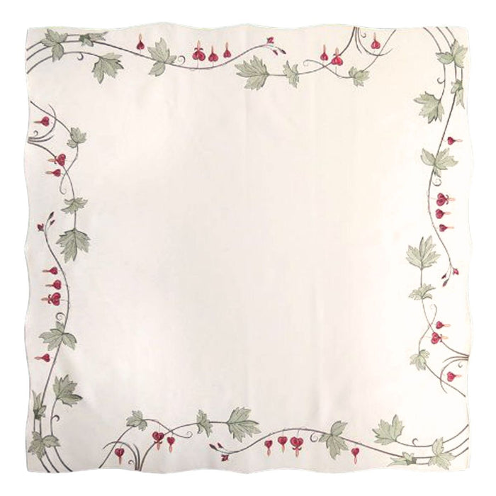 White square linen tablecloth with embroidered bleeding hearts and green vine border, scalloped edges, German made