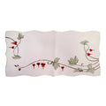 White embroidered linen table runner featuring traditional bleeding heart flowers, green vine accents, and scalloped edges in a German-inspired floral design.