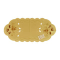 Cream color table runner with cutouts on both ends, and a scene depicting a snow covered chalet, forest, and deer on either side.