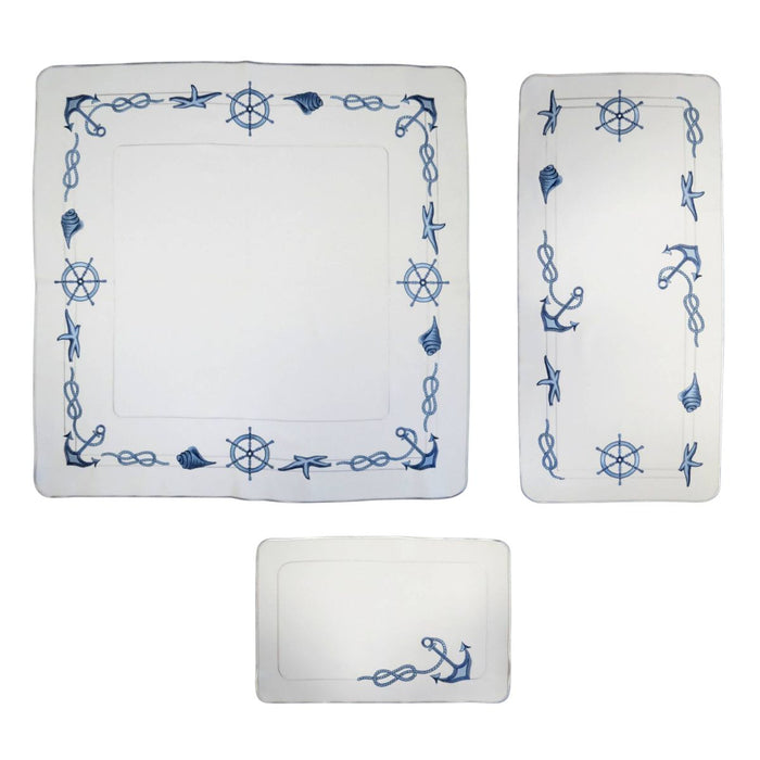 white linen table set with blue nautical embroidery including table runner square tablecloth and placemat anchors ship wheel rope seashell design Funke Germany