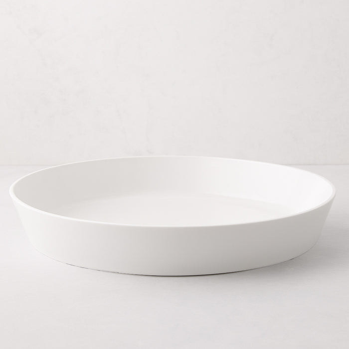 Luce Large white ceramic serving dish, 15" diameter, with a minimalistic, sleek design.