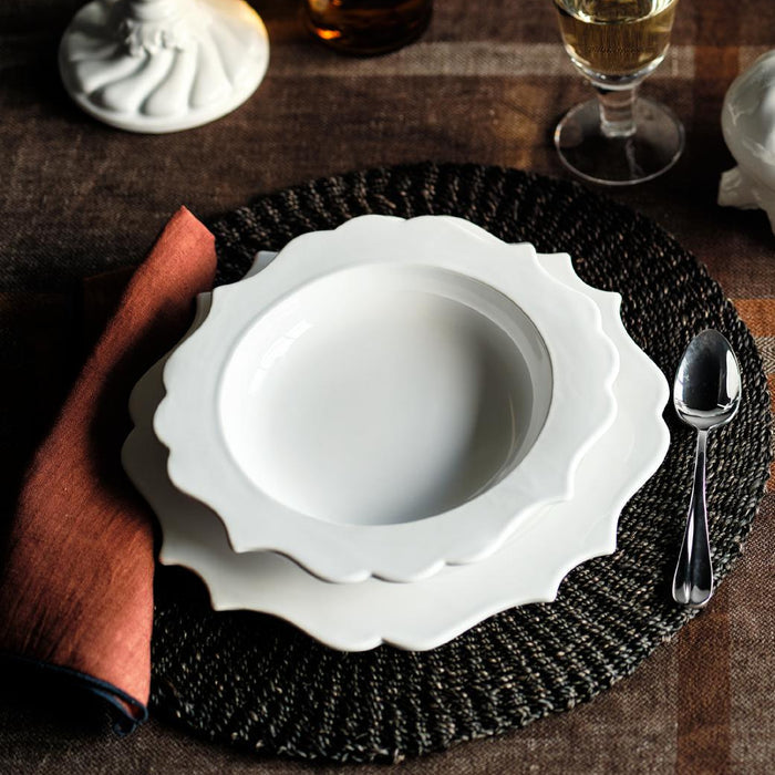 White ceramic Lungarno dinner plate with a sculptural scalloped edge, 11-inch diameter, Italian-made design.