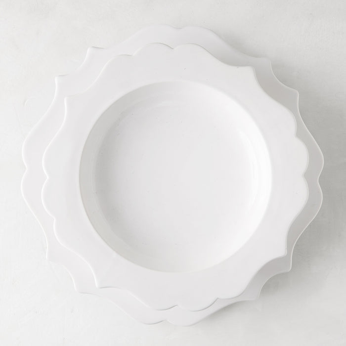 White ceramic Lungarno soup bowl with sculptural, scalloped edges, 9.5" diameter.