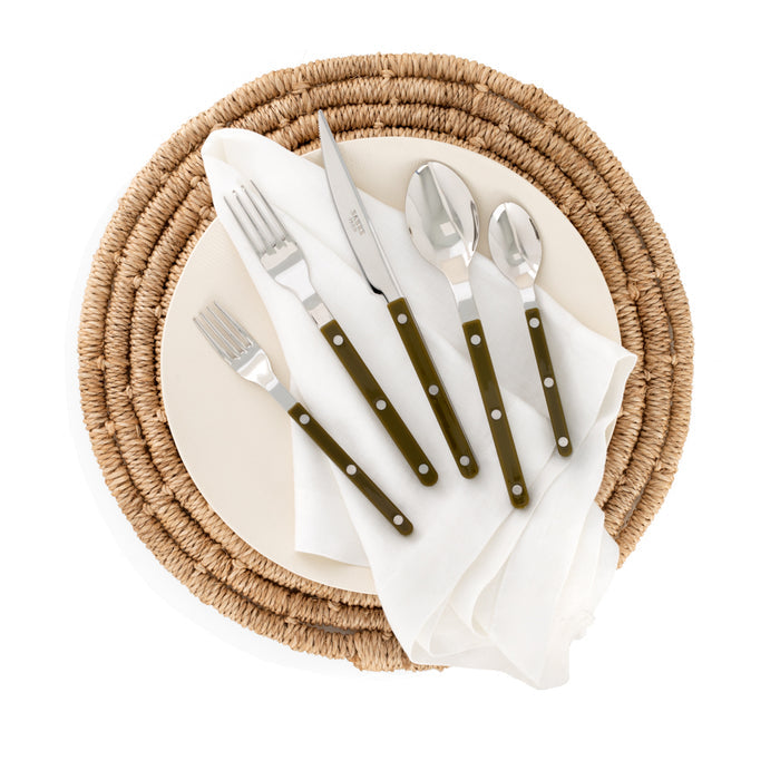Olive green Bistro 5-piece flatware set with stainless steel and acrylic handles on a woven placemat.