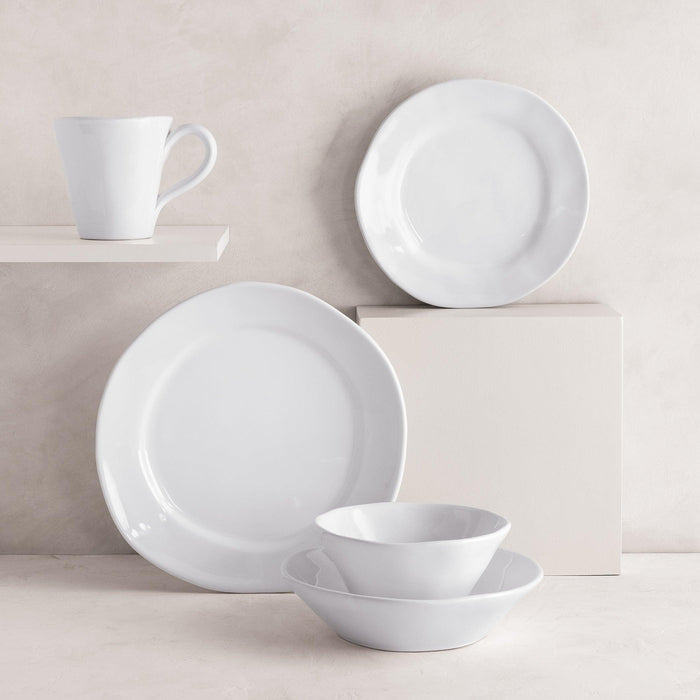 Creamy white ceramic breakfast bowl with subtle organic edges, part of the HG Organic Ceramic Collection.