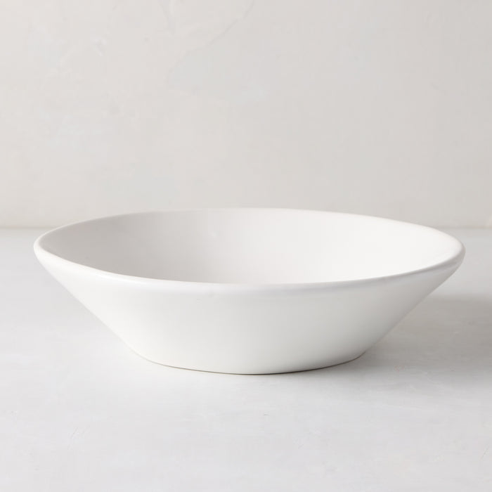 Organic Low Bowl, 9" creamy white ceramic with subtle organic edges.