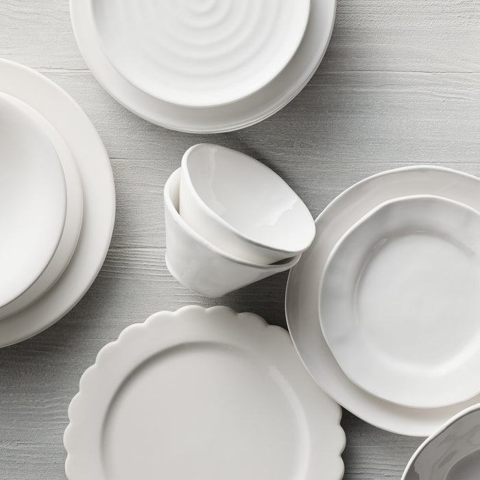 White ceramic salad plate with subtle organic edges from the HG Organic Ceramic Collection.