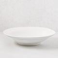 Organic Ceramic Serve Bowl, 16" diameter, creamy white glaze, subtle organic edges.